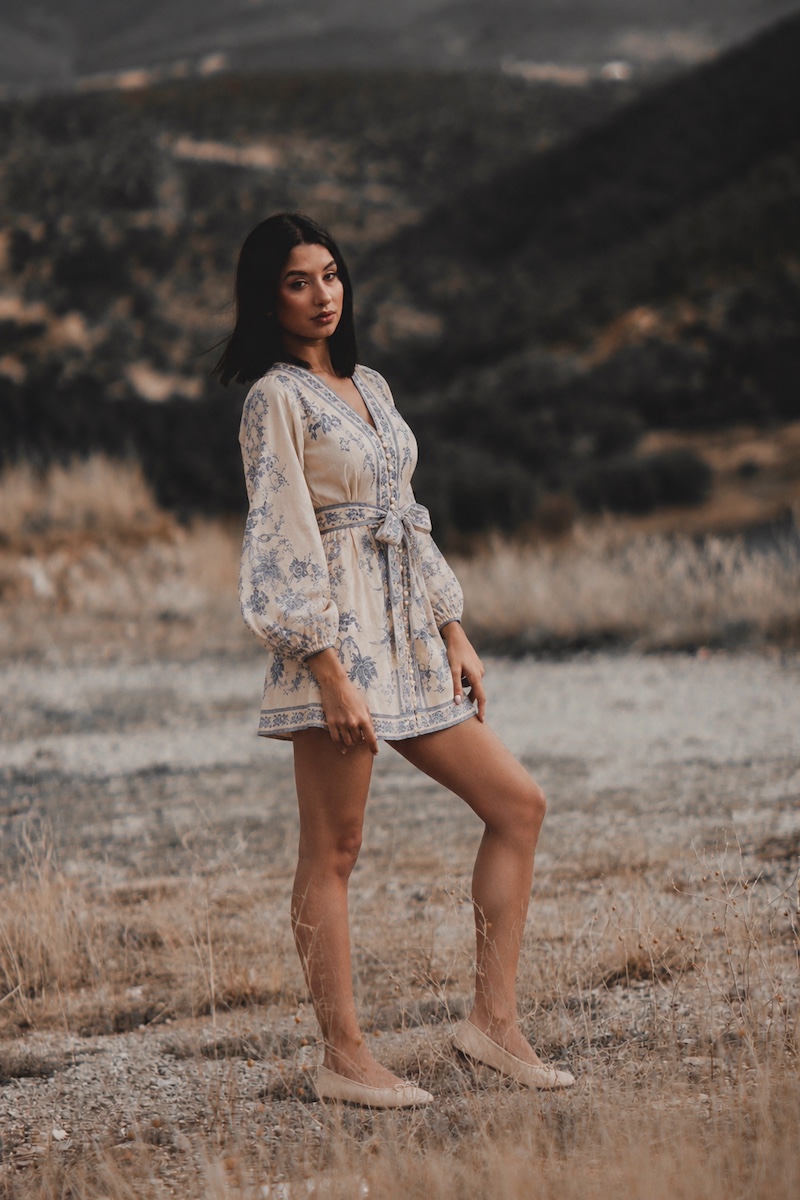Model in a floral wrap dress